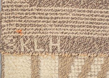 a carpet, knotted pile in relief, ca 187,5-189,5 x 96,5-100 cm, signed and dated S.K.L.H. 1945 at the back.