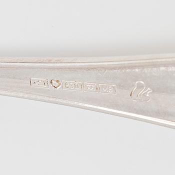 A 59-piece silver 'Chippendale' cutlery set, 20th century. Various Finnish manufacturers.