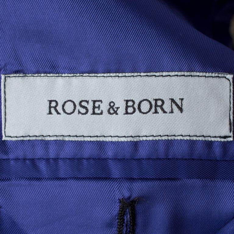 ROSE & BORN, a men's black wool suit consisting of jacket and pants.