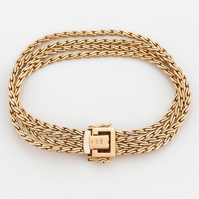 An 18K gold bracelet, Italian hallmark.