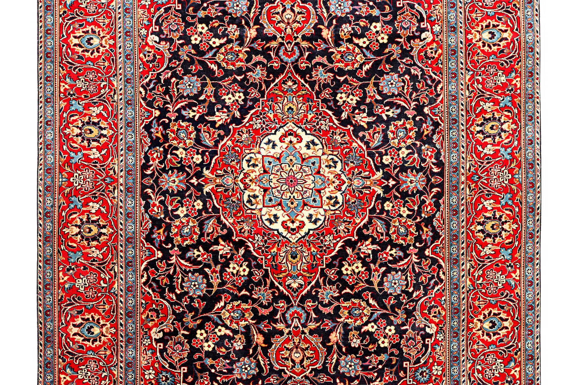 A Kashan carpet, a. 300 x 195 cm.