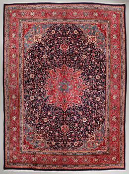 A Sarouk rug, old, 402 x 302 cm.