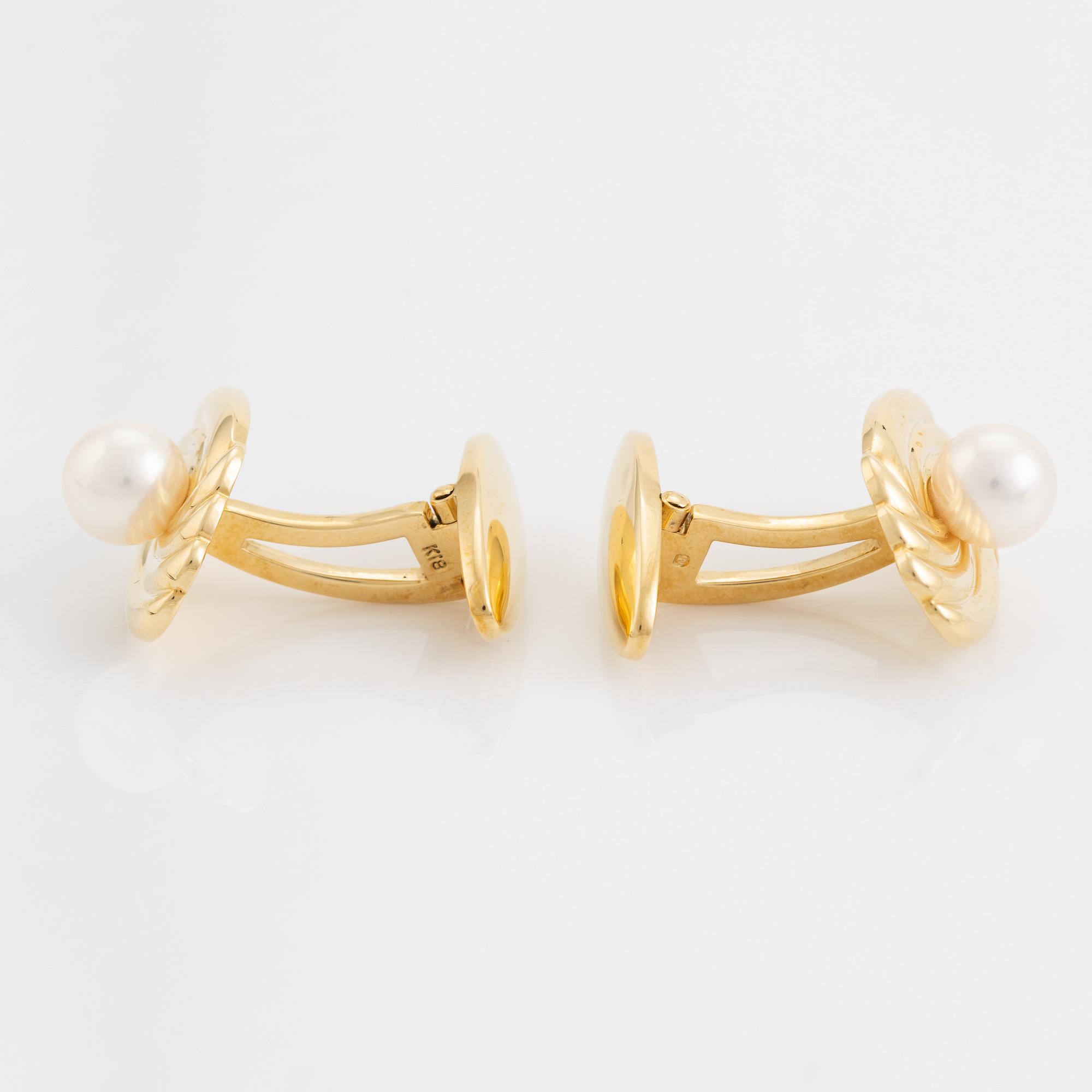 Ett par manschettknappar, Mikimoto, 18K guld med odlad pärla.