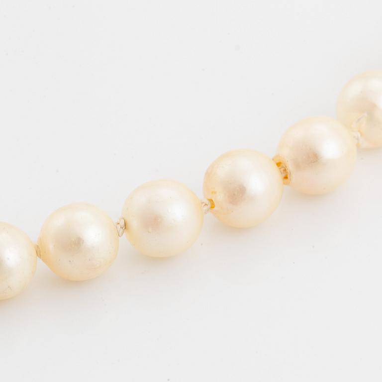 Cultured pearl necklace, with heart shaped charm.