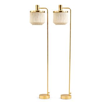 5. Hans-Agne Jakobsson, a pair of brass floor lamps, Markaryd, Sweden 1960-70's.