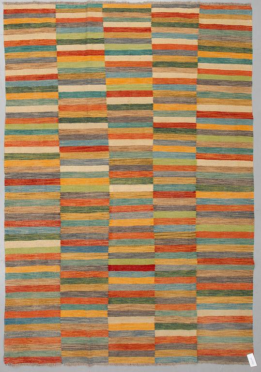 A CARPET, kilim, ca 291 x 199 cm.