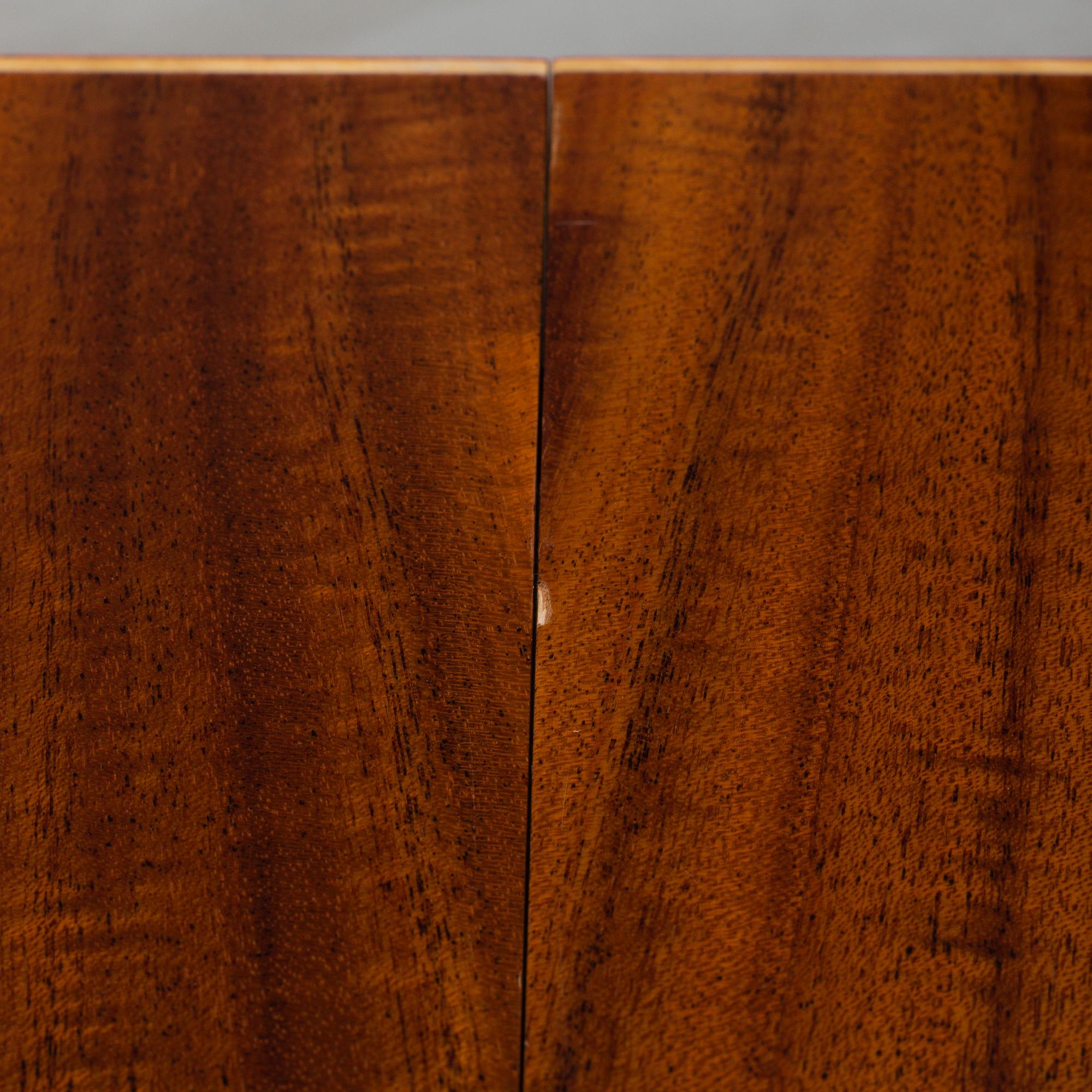 JOSEF FRANK, a model 771 mahogany dining table, Svenskt Tenn.