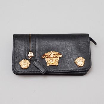 a VERSACE wallet.