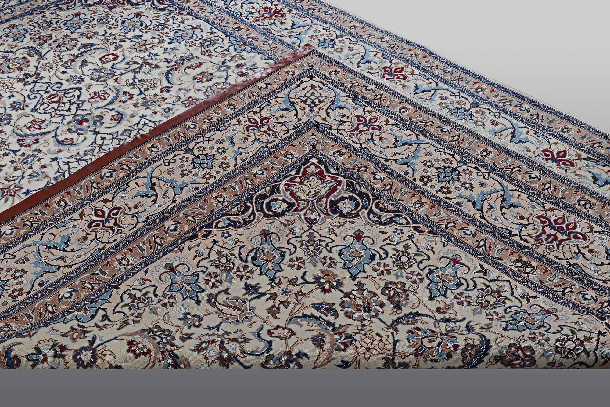 A carpet, Nain, so called 9 laa, part silk, ca 360 x 240 cm.