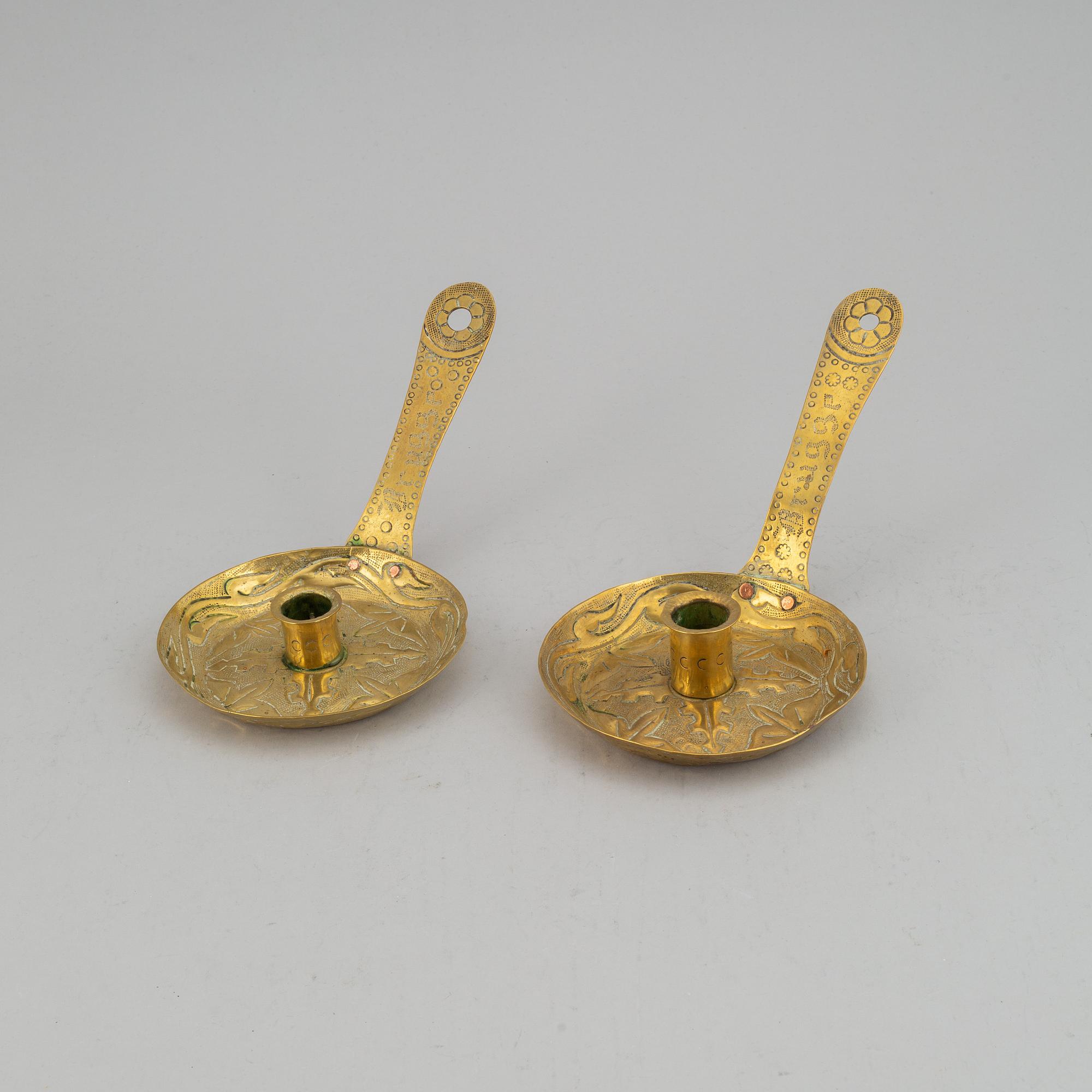 A pair of 19th century brass night light holders.