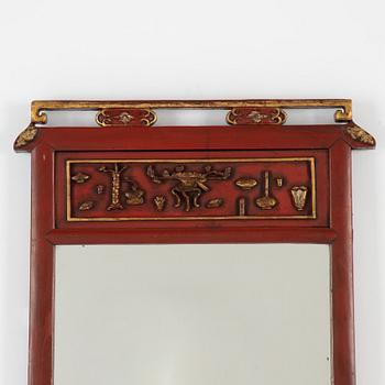 A lacquered mirror, Qing dynasty, 19th century.
