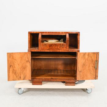 An Art Deco walnut cabinet/record player first half of the 20th century.