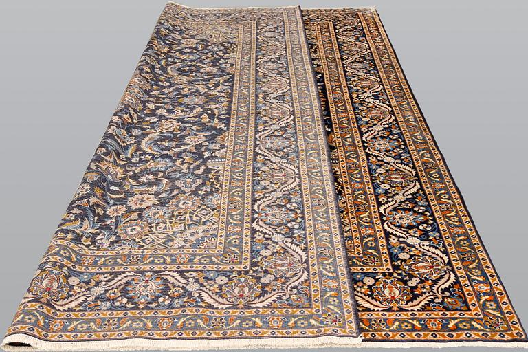 A Kashmar carpet 333 x 252 cm.