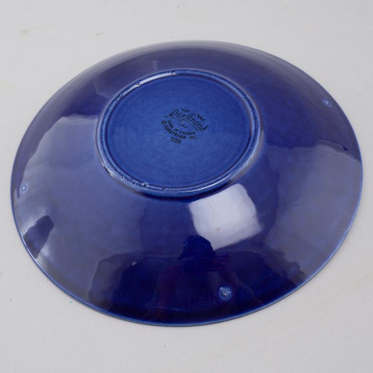 34 pieces of porcelain tableware by Hertha Bengtson for Rörstrand, model "Blå eld", second half of the 20th century.