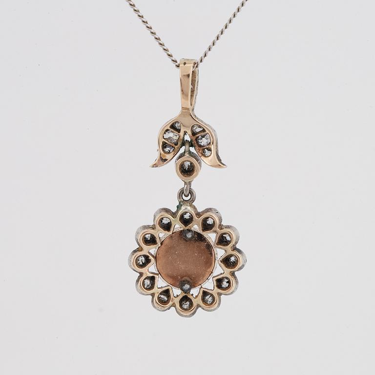 Old-cut diamond and pearl pendant.