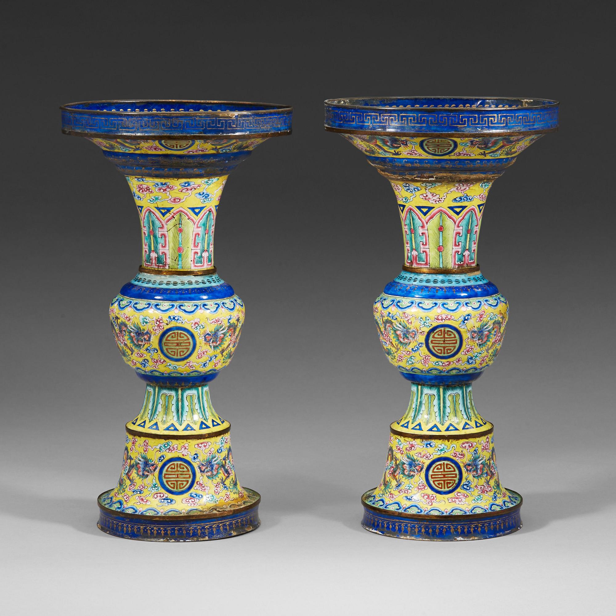 A pair of enamel on copper vases, Qing dynasty, 19th Century.