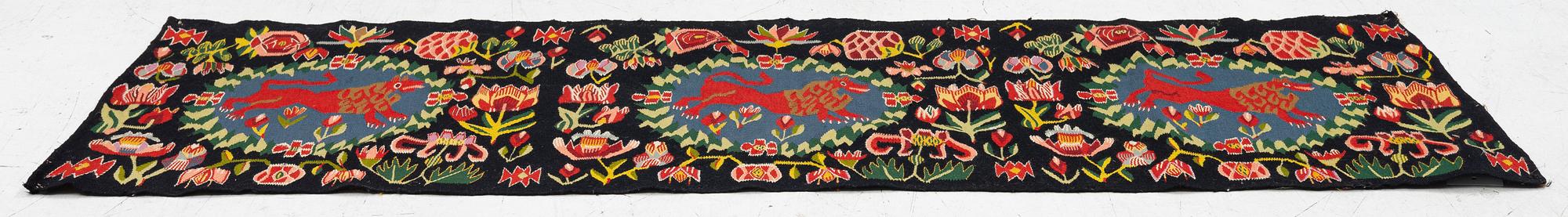 Åkdyna, "Rött Lejon", flamskväv, 140 x 50 cm, sydvästra Skåne, tidigt 1900-tal.