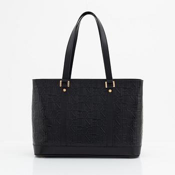 Céline, a black leather bag.