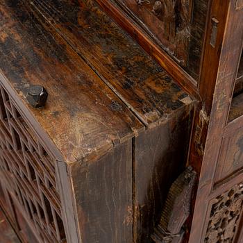 A cabinet, China, 20th century with older parts.