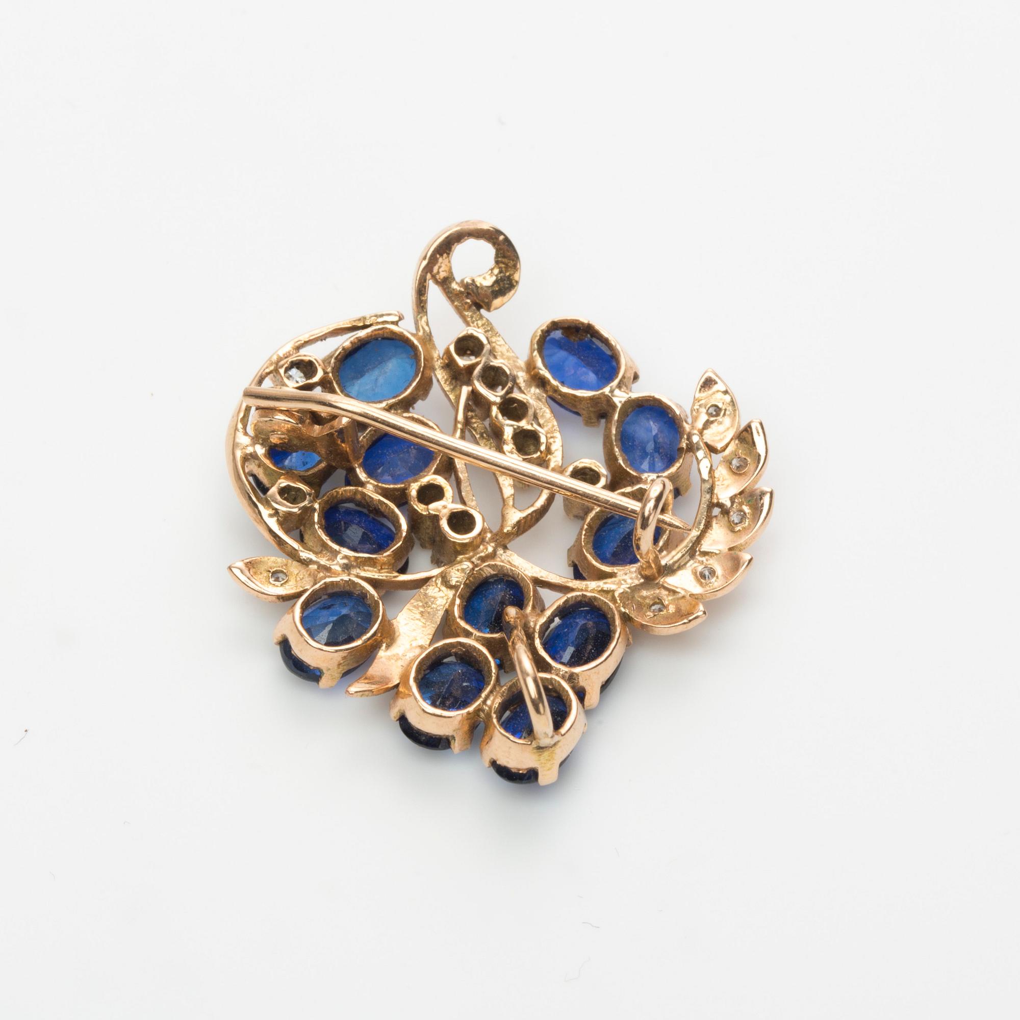 BROSCH/HÄNGE, 14K guld med safirer samt briljantslipade diamanter ca 0.20 ct.
