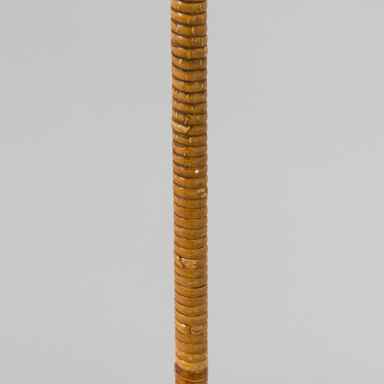 Paavo Tynell, a mid-20th century K10-10 floor lamp for Taito.