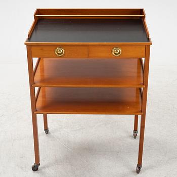 Josef Frank, a mahogany serving table/bar table, model 2227, Firma Svenskt Tenn, second half of the 20th century.