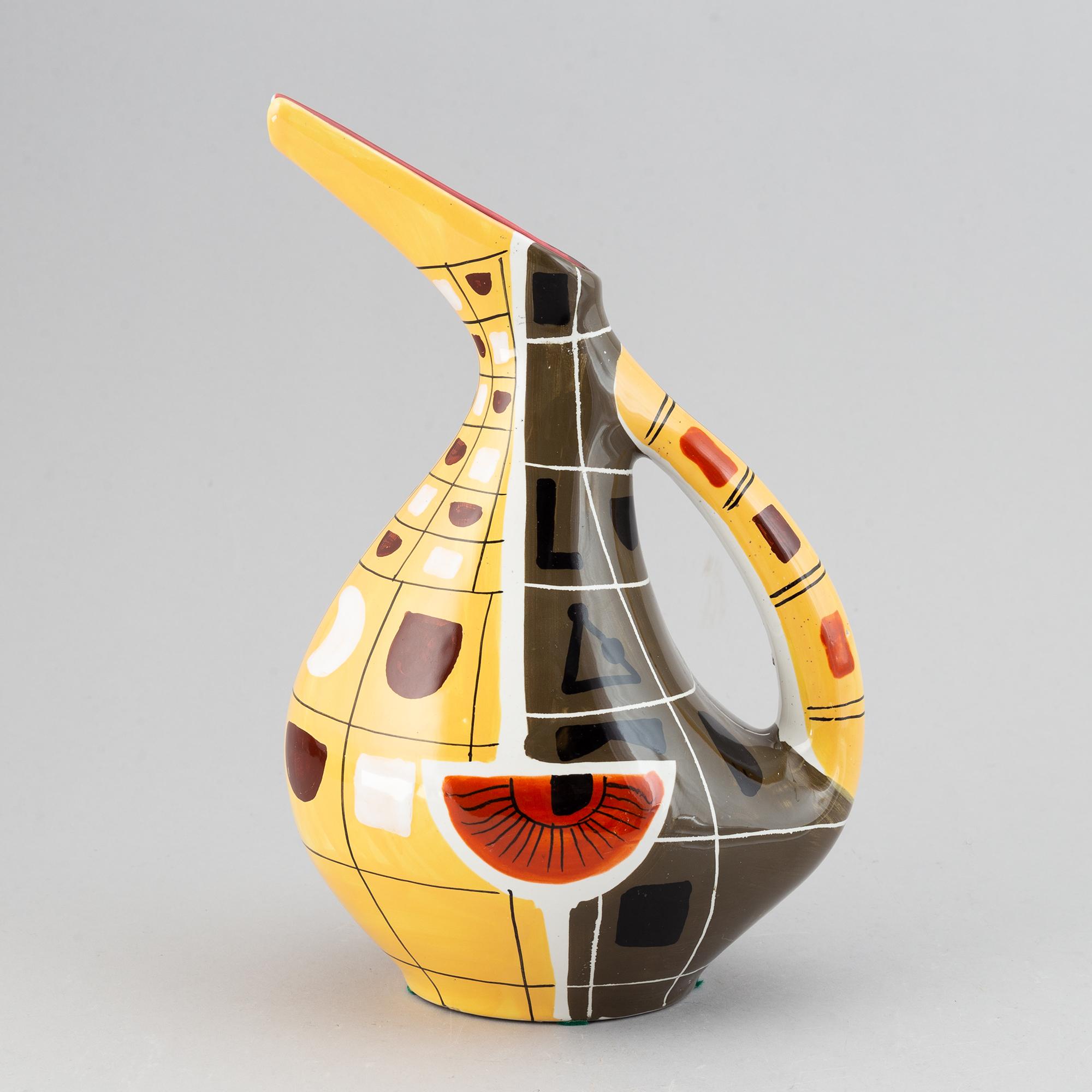 Deruta, a mid 20th century glazed ceramic ewer.