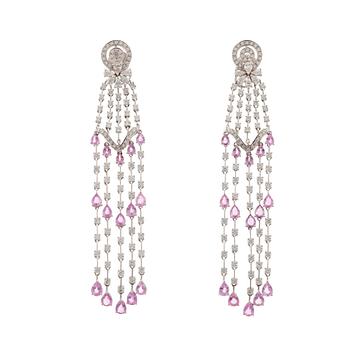 A pair of 18K white gold earrings set with faceted pink sapphires, drop- and round brilliant-cut diamonds.