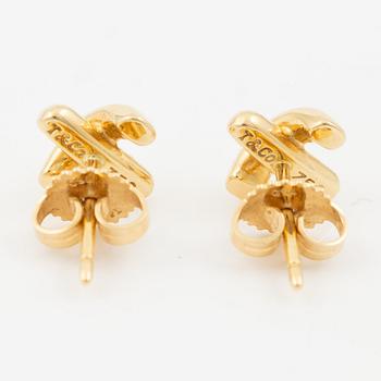 Tiffany & Co a pair of earrings 18K gold "Cross Stitch".