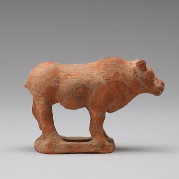Three pottery scultpures of animals and a herdsman, Tang dynasty (618-906).