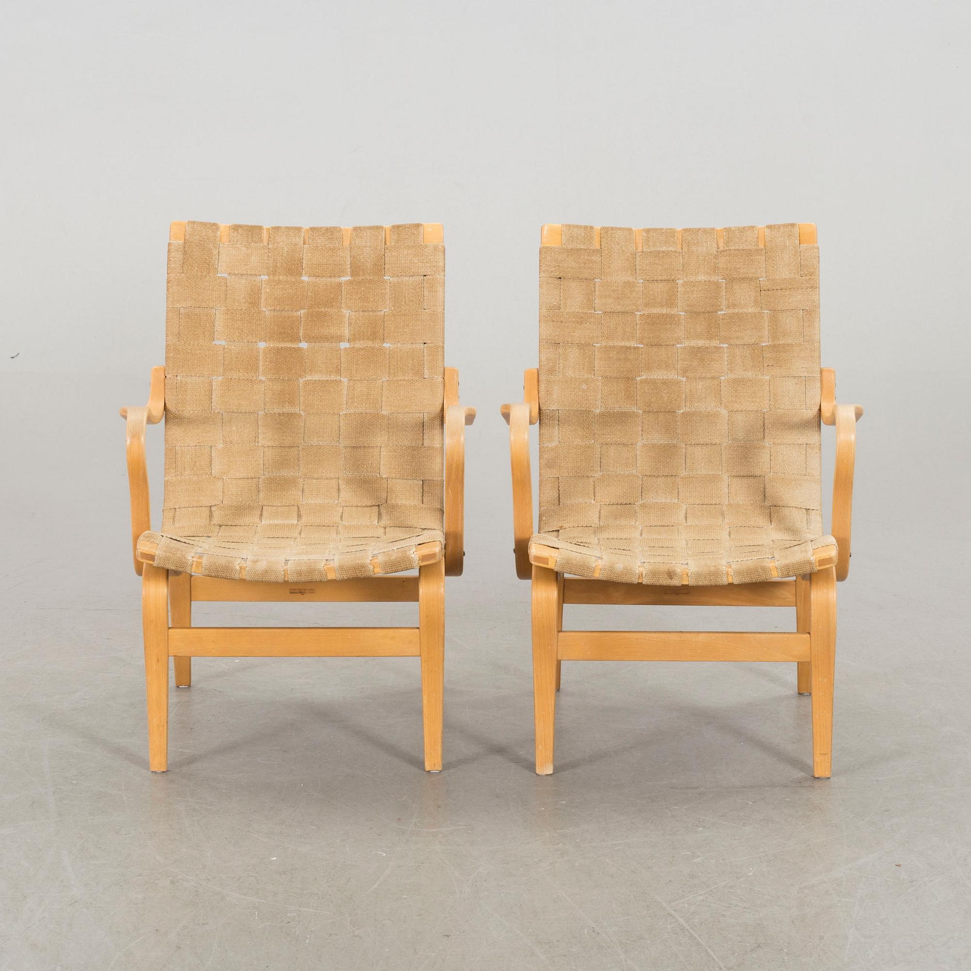 BRUNO MATHSSON, a pair of Eva armchairs.