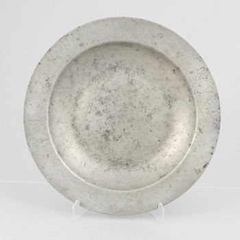 A large pewter charger, Sweden, dated 1701.