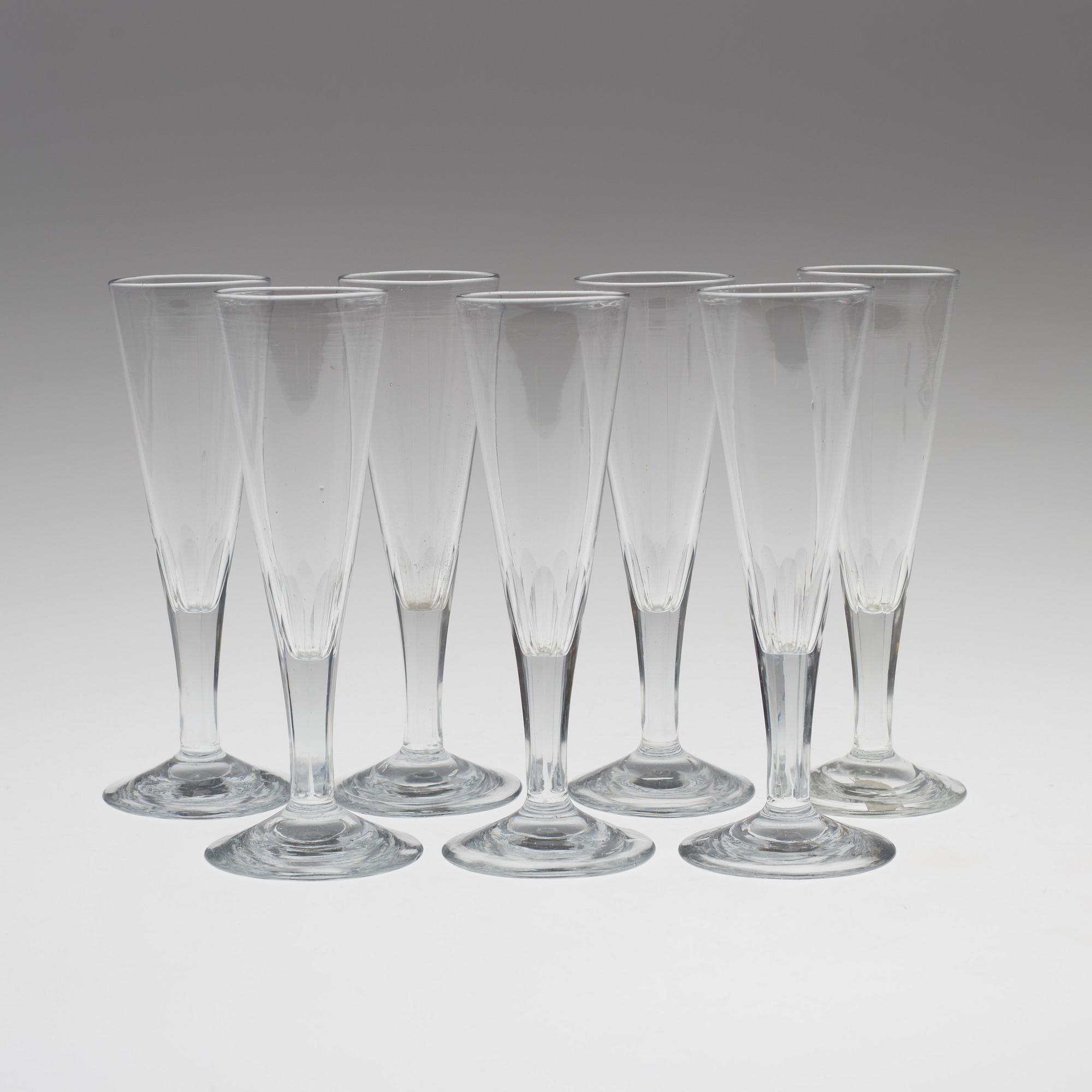 SEVEN MID 19TH CENTURY CHAMPAGNE GLASSES.