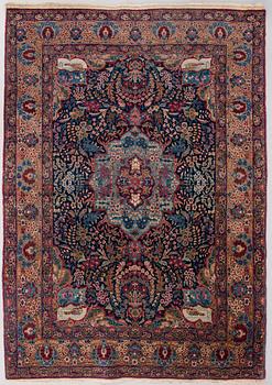 A rug, semi-antique Tabriz. Circa 142 x 198 cm.