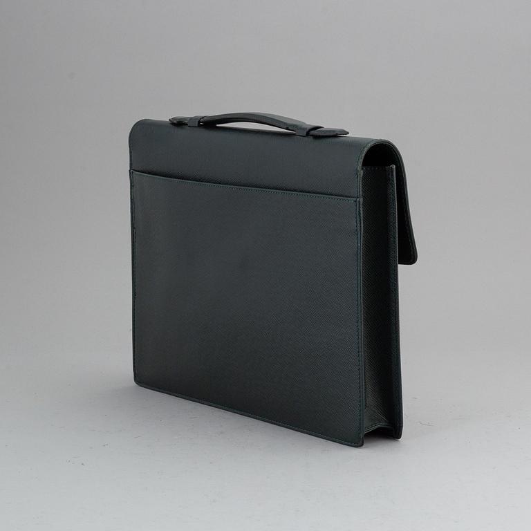 LOUIS VUITTON, a 'Taiga Serviette Kourad' briefcase.