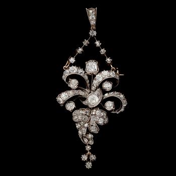 A BROOCH / PENDANT, old cut diamonds, gold and silver. End of 1800s.