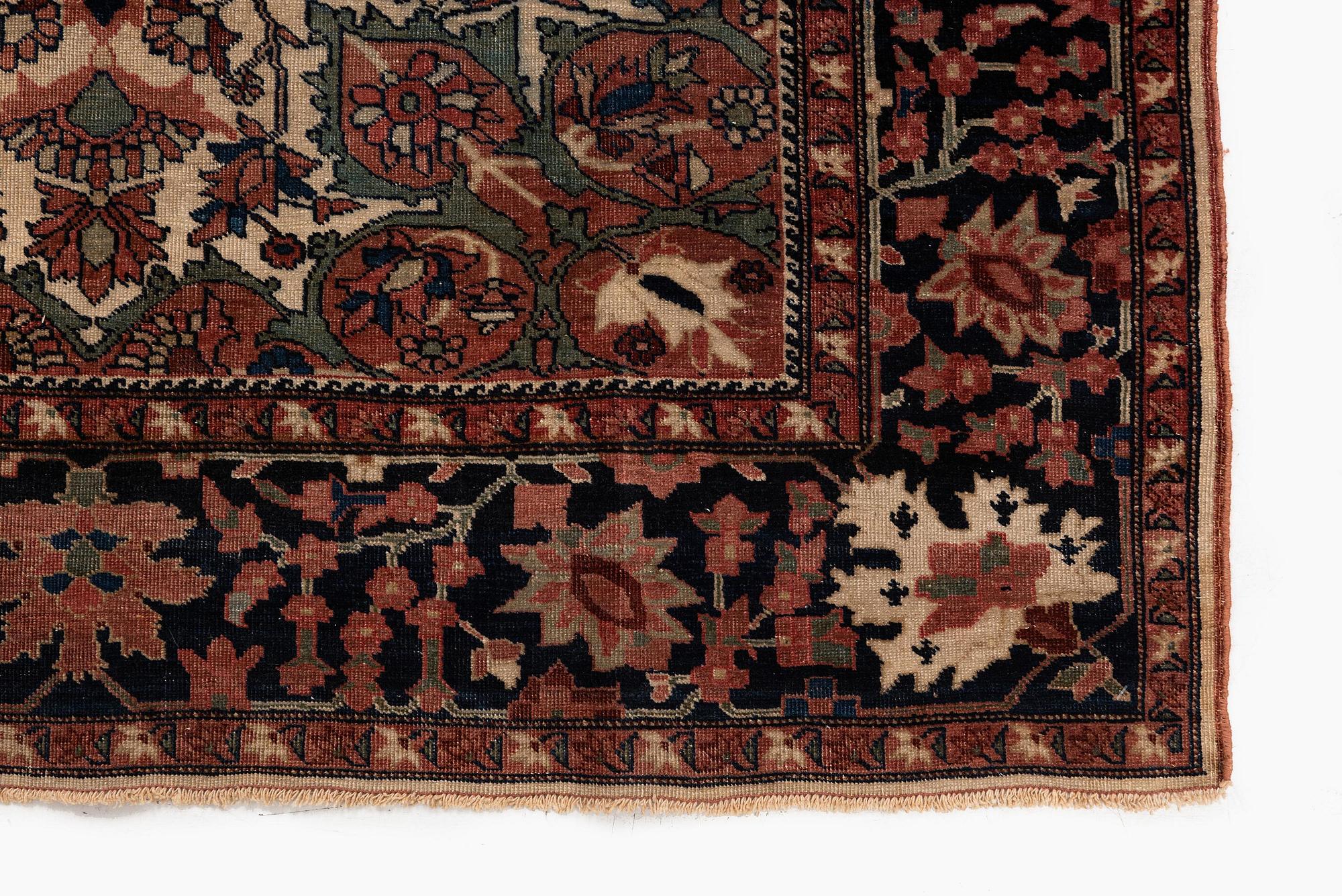 An antique Feraghan rug, Western Persia (Iran), c. 203 x 125 cm.