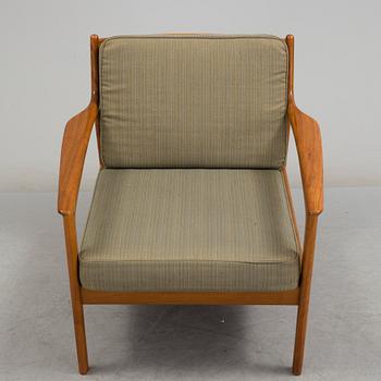 An 'USA 75' easy chair by Folke Ohlsson, Dux.