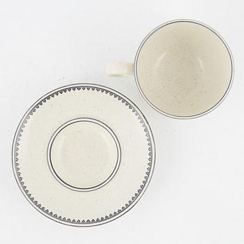 Stig Lindberg, a' Birka' cup with saucer, with royal monogram under crown, Gustavsberg, 1976.