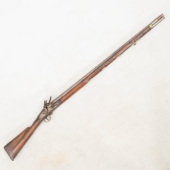 A British flintlock gun, 18th century.