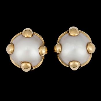 233. A pair of mabe pearl earrings.