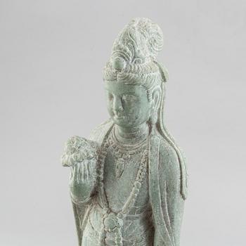 A carved Chinese stone figurine of Guanyin, first half of the 20th century.