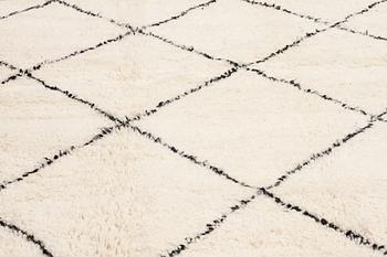 A moroccan rug, 295 x 205 cm.