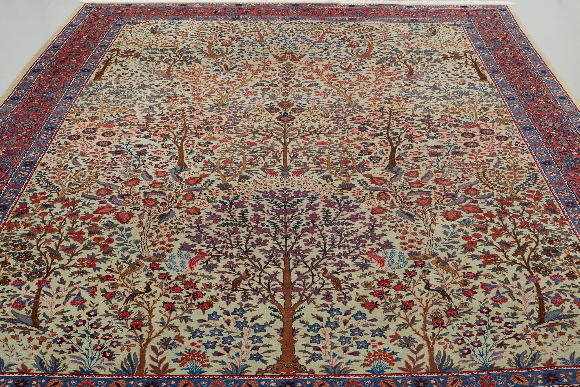 A CARPET, a semi-antique Tabriz probably, ca 393 x 284 cm.