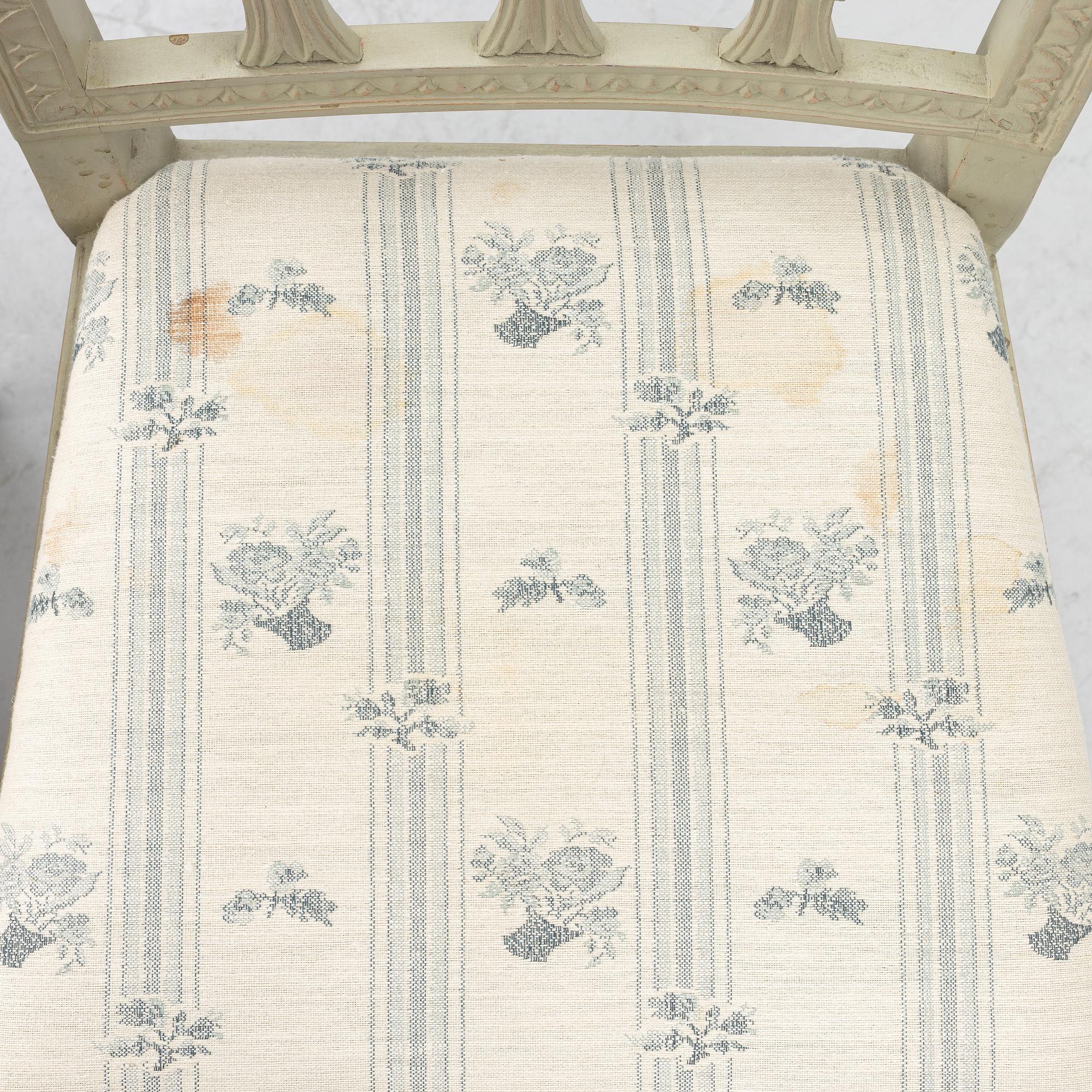 A pair of late Gustavian chairs from around the year 1800.