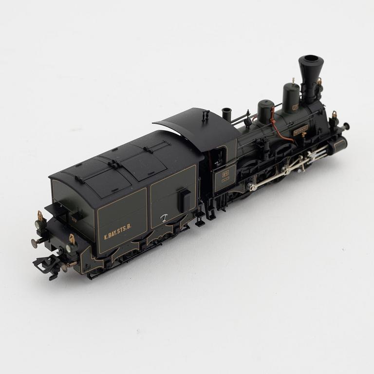 Märklin, a steam locomotive 3497 and car set no 4897, in boxes.