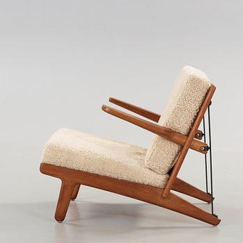 Børge Mogensen, an oak and iron easy chair, Fredericia, Denmark 1950's.