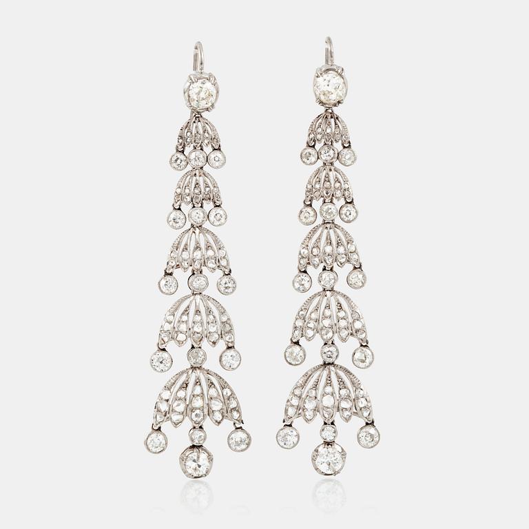 A pair of chandelier diamond earrings. Old- and rose-cut diamonds, total carat weight circa 7.50 cts.