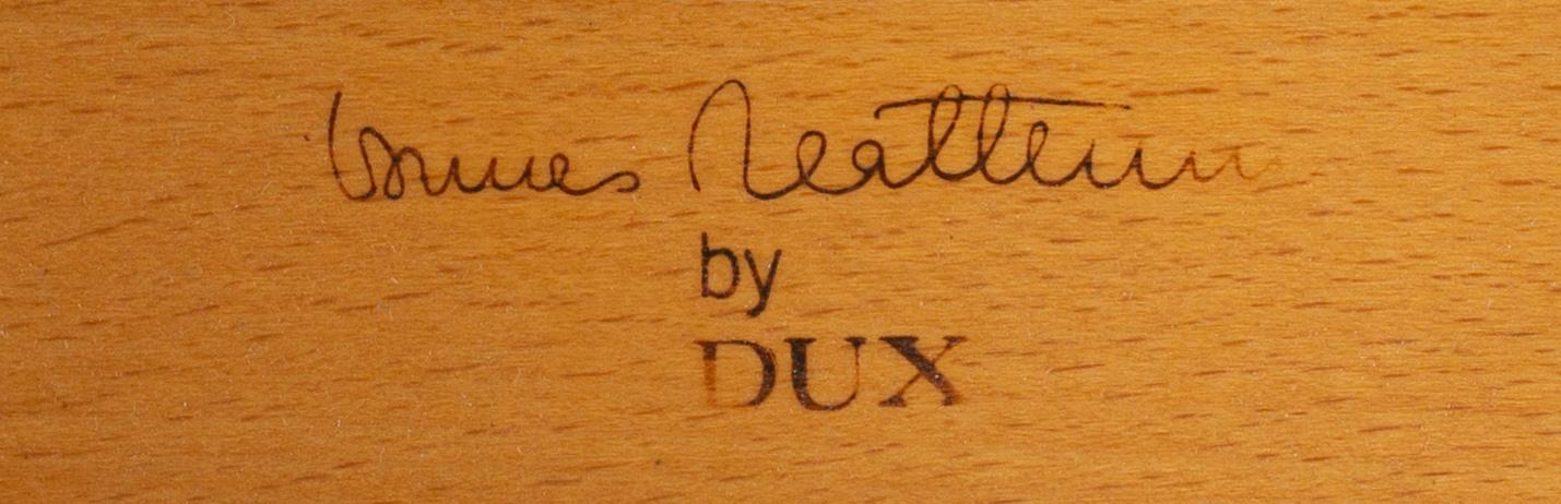 BRUNO MATHSSON, an "ingrid" armchair and stool for Dux. Late 20th century.