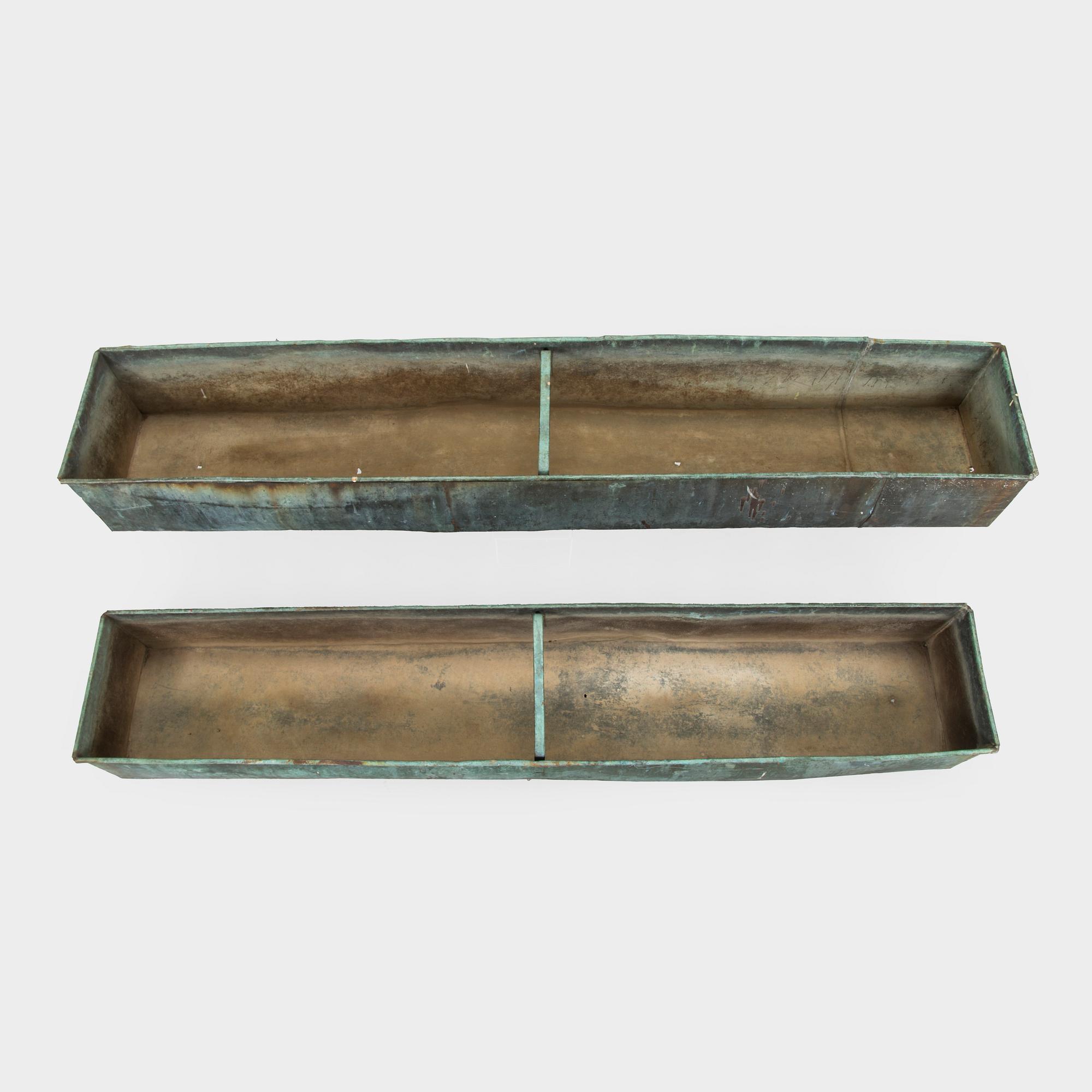 Two mid-20th century planters.